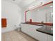 Bright main bathroom features double sinks with granite countertops and ample vanity space at 1440 Portola Ave, Deltona, FL 32738