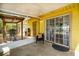 Screened porch looking to the exterior gazebo, and outdoor yard at 1511 Jack St, Tavares, FL 32778