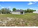 Expansive backyard featuring a well-maintained lawn, perfect for outdoor activities and relaxation at 1601 Toledo Ave, Deltona, FL 32725