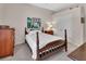 Bedroom with vintage-style wooden furniture, a closet and soft neutral walls at 1661 Timber Hills Dr, Deland, FL 32724