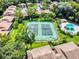 Community aerial view showcasing tennis courts and a pool at 168 Perimeter Ct # 5B, Deltona, FL 32725