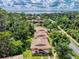 Aerial view highlights community with lake backdrop at 168 Perimeter Ct # 5B, Deltona, FL 32725