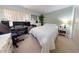 Comfortable bedroom featuring a neutral color scheme, ample natural light, and closet space at 168 Perimeter Ct # 5B, Deltona, FL 32725