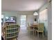 Cozy living room with comfortable seating, large windows and access to a balcony at 168 Perimeter Ct # 5B, Deltona, FL 32725