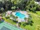 Aerial photo of a community pool surrounded by green spaces at 168 Perimeter Ct # 5B, Deltona, FL 32725