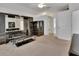 A Primary bedroom showcases a stylish wall unit, carpet, and ample natural light at 1925 Hamilton Ave, Orange City, FL 32763