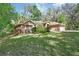 Lovely single-story brick home nestled amongst mature trees, offering shade and privacy at 1925 Hamilton Ave, Orange City, FL 32763