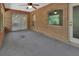 A covered patio with brick and concrete, offering a space for outdoor relaxation at 1925 Hamilton Ave, Orange City, FL 32763