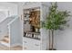 Charming coffee bar with built-in shelving, decorative accents, and a coffee maker at 199 Verde Way, Debary, FL 32713