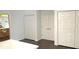 Hallway with multiple closet doors and hardwood flooring, providing ample storage space throughout the home at 2053 Bond Rd, Deland, FL 32720