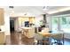 Spacious kitchen featuring a breakfast bar, stainless appliances, and abundant natural light, perfect for entertaining at 2053 Bond Rd, Deland, FL 32720