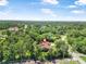 Neighborhood aerial view showcases a beautiful community with tree coverage and homes at 229 Riverbend Rd, Ormond Beach, FL 32174