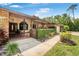 Inviting front entrance featuring a brick porch, a decorative door, and well-maintained landscaping, adding to the home's charm at 229 Riverbend Rd, Ormond Beach, FL 32174