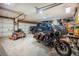 Spacious garage for parking vehicles and recreational equipment at 229 Riverbend Rd, Ormond Beach, FL 32174