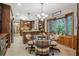Eat-in kitchen area with views of the backyard, complete with custom cabinetry at 229 Riverbend Rd, Ormond Beach, FL 32174