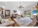 The bright living room features hardwood flooring, fireplace and sliding glass door at 229 Riverbend Rd, Ormond Beach, FL 32174