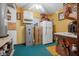 Well-organized storage room with ample shelving, a safe, and additional appliances at 229 Riverbend Rd, Ormond Beach, FL 32174