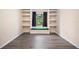 View of an empty bedroom featuring built in shelving and a window seat at 2395 Old Reynolds Rd, De Leon Springs, FL 32130