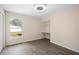 Bedroom featuring a built-in desk, wood floors and natural light at 2395 Old Reynolds Rd, De Leon Springs, FL 32130
