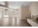 Inviting living room with high ceilings, arched doorway, and abundant natural light at 2395 Old Reynolds Rd, De Leon Springs, FL 32130