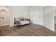Bright living area featuring sleek floors, neutral walls, and ample natural light at 2395 Old Reynolds Rd, De Leon Springs, FL 32130