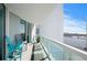 Enjoy the views from this condo's balcony featuring chairs for relaxing and taking in the scenery at 241 Riverside Dr # 1909, Daytona Beach, FL 32117