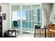 Bright sitting area with an expansive view of the bay, high-rise and a glimpse of the Gulf at 241 Riverside Dr # 1909, Daytona Beach, FL 32117