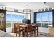 Comfortable dining room with plenty of natural light, city view and unique decorative touches at 241 Riverside Dr # 1909, Daytona Beach, FL 32117