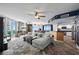 Spacious living room with hardwood floors and sliding doors leading to a balcony at 241 Riverside Dr # 1909, Daytona Beach, FL 32117