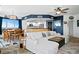 Bright living room with a dining area and a modern kitchen, perfect for entertaining at 241 Riverside Dr # 1909, Daytona Beach, FL 32117