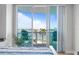 Balcony view featuring patio furniture and stunning water views with a blue sky backdrop at 241 Riverside Dr # 304, Daytona Beach, FL 32117