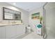 Well-lit bathroom features a stand-up shower, offering a clean and refreshing feel at 241 Riverside Dr # 304, Daytona Beach, FL 32117