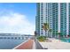 Modern high rise building features a waterfront walking path, beautiful views, and a sparkling in-ground pool at 241 Riverside Dr # 304, Daytona Beach, FL 32117