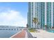 Modern high rise building features a waterfront walking path, beautiful views, and a sparkling in-ground pool at 241 Riverside Dr # 304, Daytona Beach, FL 32117