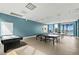 Game room featuring ping pong tables, an air hockey table, and views of the pool at 241 Riverside Dr # 304, Daytona Beach, FL 32117