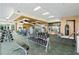 Modern gym with various exercise equipment and weights for a comprehensive workout at 241 Riverside Dr # 304, Daytona Beach, FL 32117