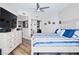 Well-lit main bedroom with a king bed, ample closet space, and modern furnishings at 241 Riverside Dr # 304, Daytona Beach, FL 32117