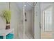 Modern tiled shower with glass door and wall-mounted shower head at 241 Riverside Dr # 304, Daytona Beach, FL 32117