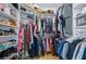 Spacious walk-in closet with custom shelving, storage, and organized clothing racks at 241 Riverside Dr # 304, Daytona Beach, FL 32117