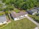Aerial view showcasing the home and its fully-fenced backyard, with plenty of space for outdoor activities and privacy at 243 S Hull Ave, Deland, FL 32720