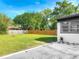 The spacious backyard includes a new privacy fence and well-maintained lawn, perfect for outdoor activities at 243 S Hull Ave, Deland, FL 32720