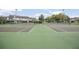 Well-maintained tennis courts offer residents an opportunity for recreation and exercise at 2596 Lancaster Ct, Apopka, FL 32703