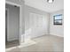 Spare bedroom with tile floors, neutral walls, and three closets at 265 S Fairbairn Dr, Deltona, FL 32725