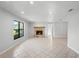 Inviting living room with tile flooring and stone fireplace at 265 S Fairbairn Dr, Deltona, FL 32725