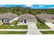 Charming single-Gathering home with well-manicured lawn and a two-car garage at 2686 Neverland Dr, New Smyrna Beach, FL 32168