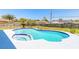 Sparkling backyard pool with integrated spa and well-maintained landscaping, creating a serene oasis at 2819 Silver Palm Dr, Edgewater, FL 32141