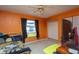 Well-lit bedroom featuring a ceiling fan, closet, and comfortable furnishings at 291 Sagewood Dr, Port Orange, FL 32127