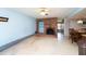 Spacious living room with brick fireplace and neutral flooring at 291 Sagewood Dr, Port Orange, FL 32127