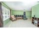 Inviting living room with window, tile floors, comfortable seating and neutral-toned walls at 291 Sagewood Dr, Port Orange, FL 32127