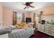 Bedroom with hardwood floors, natural light, and a ceiling fan at 2919 Griffin Rd, Leesburg, FL 34748